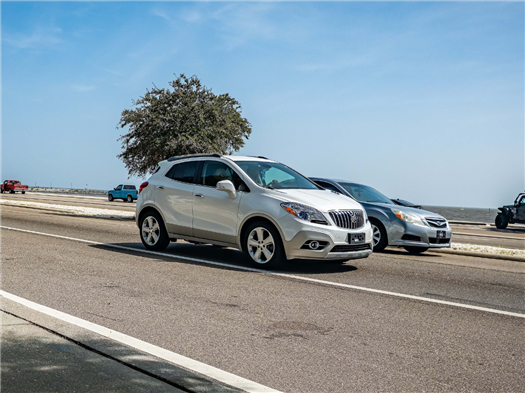 Buick Encore driving on the road