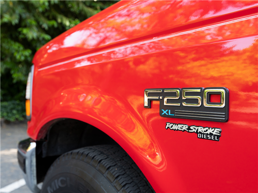 Red Ford F250 Diesel truck