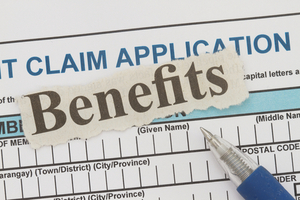 A government benefits application form with the word benefits written over it