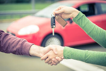 handing over the keys to the car